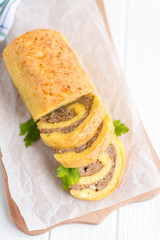 Egg rolls with meat on a white background