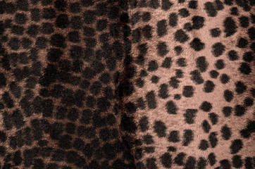 Brown and black leopard pattern.