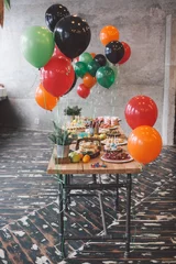 Zelfklevend Fotobehang Wooden table with different type of snacks preparing for party. © Make_story Studio