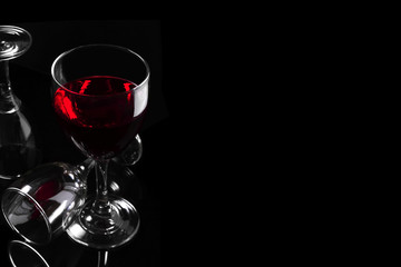 A glass of red wine with glass