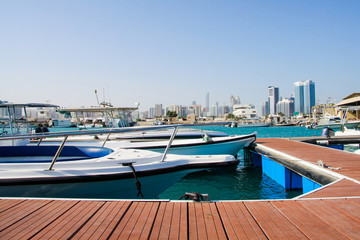 Quay with yachts and skyscrapers in Abu Dhabi, Saadiyat (Paradise) island, United Arabian Emirates (UAE)