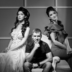 A man and two sexy women