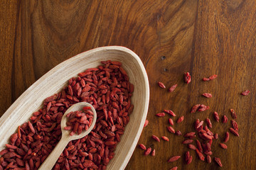 Goji berries on the wooden table