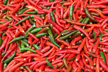 Travel to Bangkok, Thailand. The red and green chili peppers on the market.