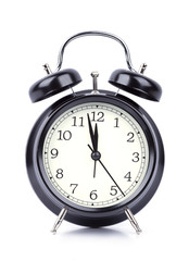 12 O' Clock on alarm clock isolated on white