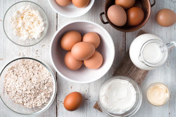 Set of farm products on the white wooden table top view