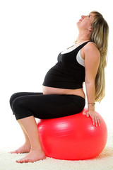 Pregnant woman with gymnastic ball