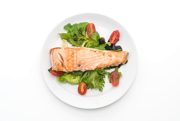 grilled salmon steak on white