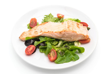 grilled salmon steak on white