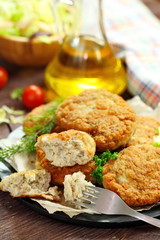 Chicken cutlets with vegetables and herbs