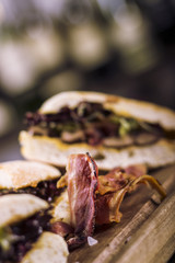 Close up of delicious sandwiches. Bacon and meat served at the restaurant.