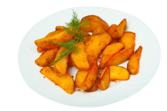 delicious fried potatoes on plate on white background