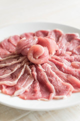 fresh sliced pork on wood