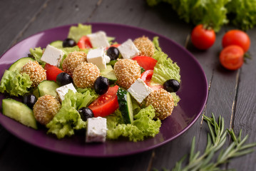 Greek salad with tomato sesame and feta