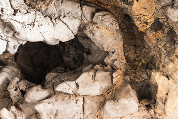 Hole cave cliff.