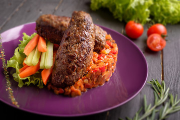 Kebab cutlet with salad and tomato