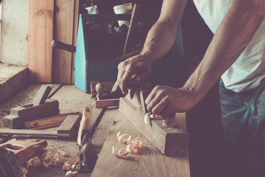 Woodworker while working in the studio