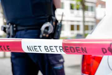 Dutch policeman on on a crime scene investigation