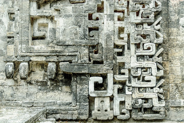 Mayan reliefs in the front of the house of the mouth of the snake in the archaeological place of Chicanna, in the reservation of the biosphere of Calakmul, Campeche, Mexico.