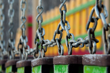 iron chain on the playground in the winter