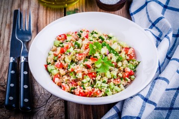 homemade tabbouleh salad with quinoa and vegetables
