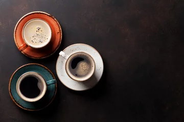 Keuken spatwand met foto Coffee cups on old kitchen table © karandaev
