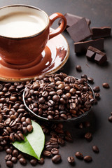 Coffee cup, beans, chocolate