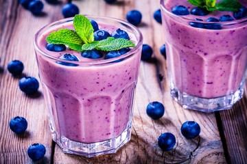 Blueberry smoothie with mint in a glass