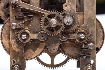 Old clockwork dirty with dust and lubricating oil. Selective foc