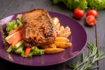 Grill bbq Chicken and chips with cherry tomato