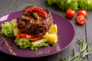 Steak grilled dish with vegetables
