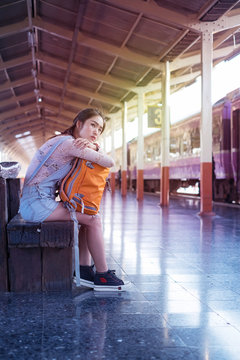 Woman waiting for train on the platform