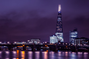 London skyline at night with shard tower skyscraper building