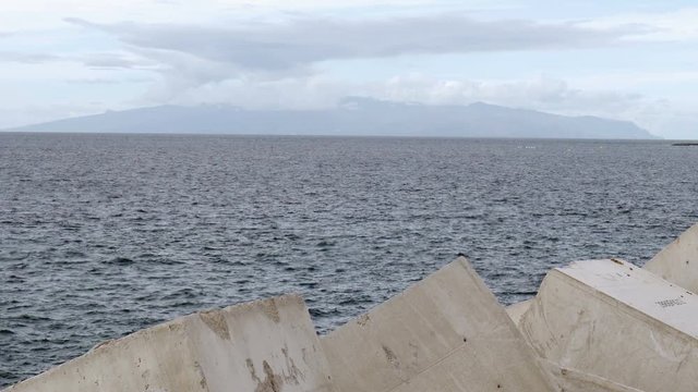 view from los cristianos in teneriffe to la gomera 

