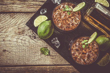 Rum and cola cocktail in glasses
