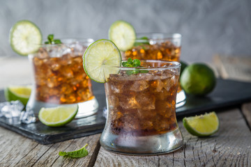 Rum and cola cocktail in glasses