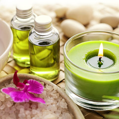 SPA still life. aromatherapy candle, essential oil and bath products