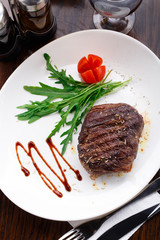 Grilled beefsteak on a plate
