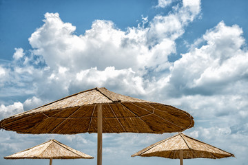 Fototapeta na wymiar Beach umbrella on sunny day