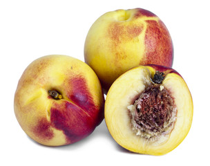 Ripe nectarines on a white background