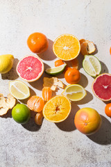 different kinds of citrus on white background