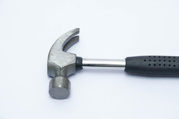 Stainless steel hammer with black handle on isolated white background