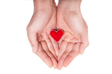 Obraz premium heart in man's hands.