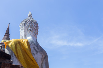 Rear view of white Buddha.