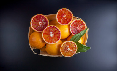 basket with red oranges