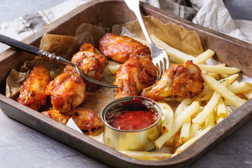 Fried chicken legs with french fries