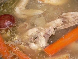 Vegetables and meat are cooked in a pot.Soup, cook chicken broth