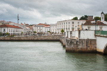 Old roman bridge in Tavira. Algarve region, Portugal.