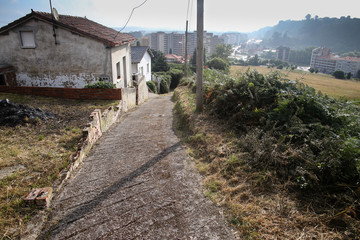 Fototapeta na wymiar The path leading to the town, panorama of the city.