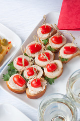 canapes on the white plates